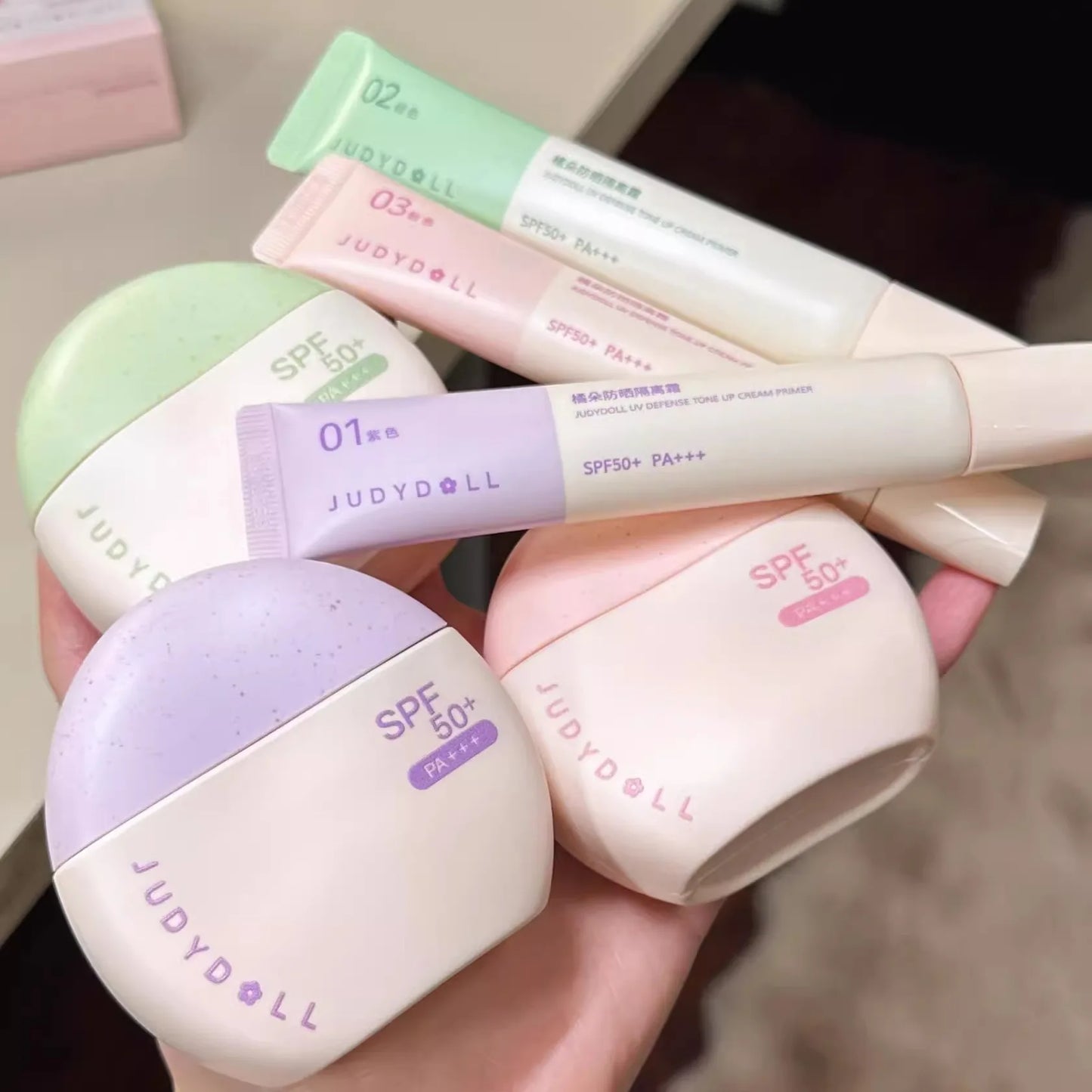 Judydoll SPF50+ sunscreen isolation cream purple makeup primer brightens and moisturizes purple bandage sunscreen
